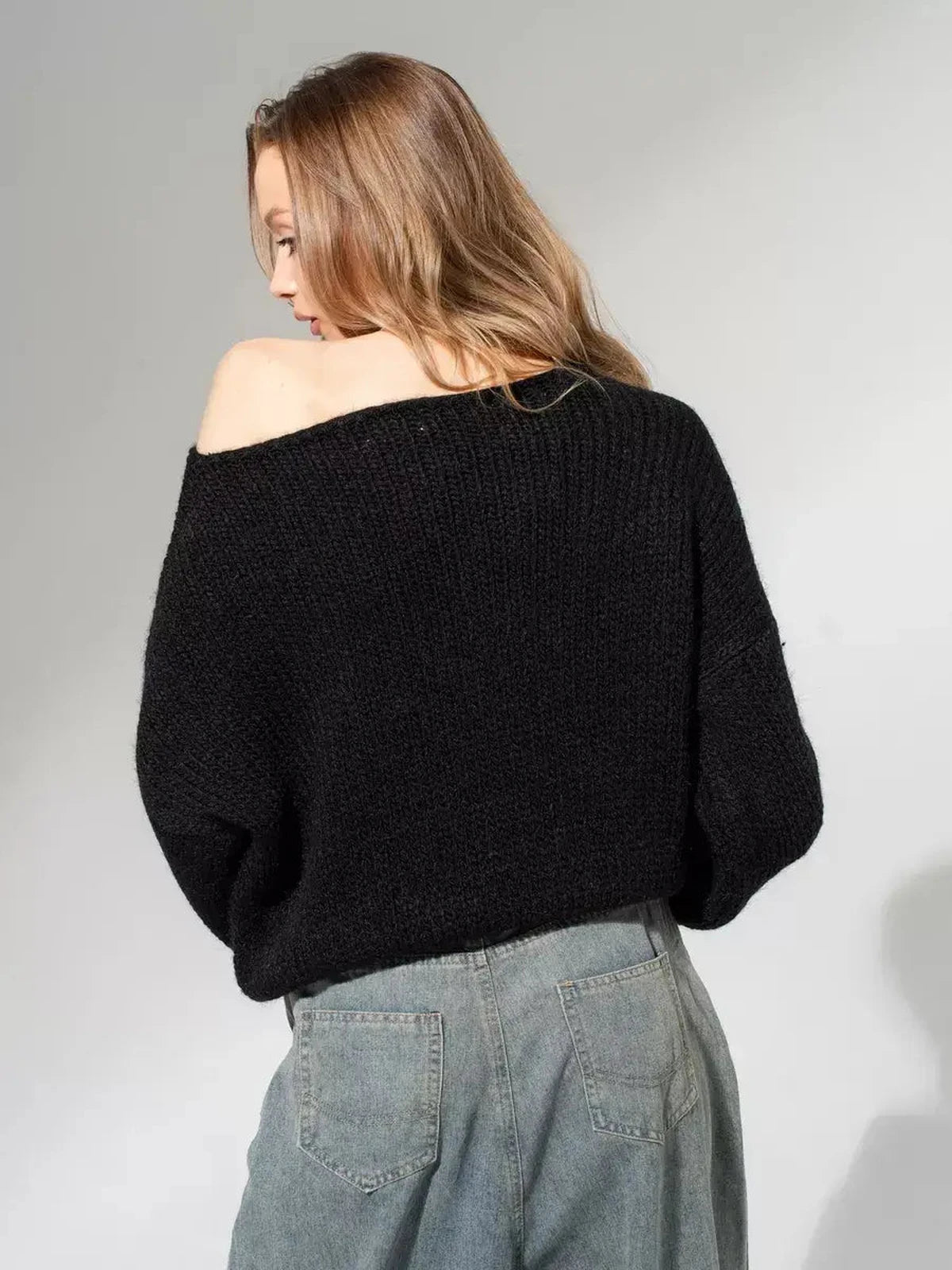 Noir Sweater by Lauven, oversized off-shoulder knit in classic black, featuring a soft and cozy design.