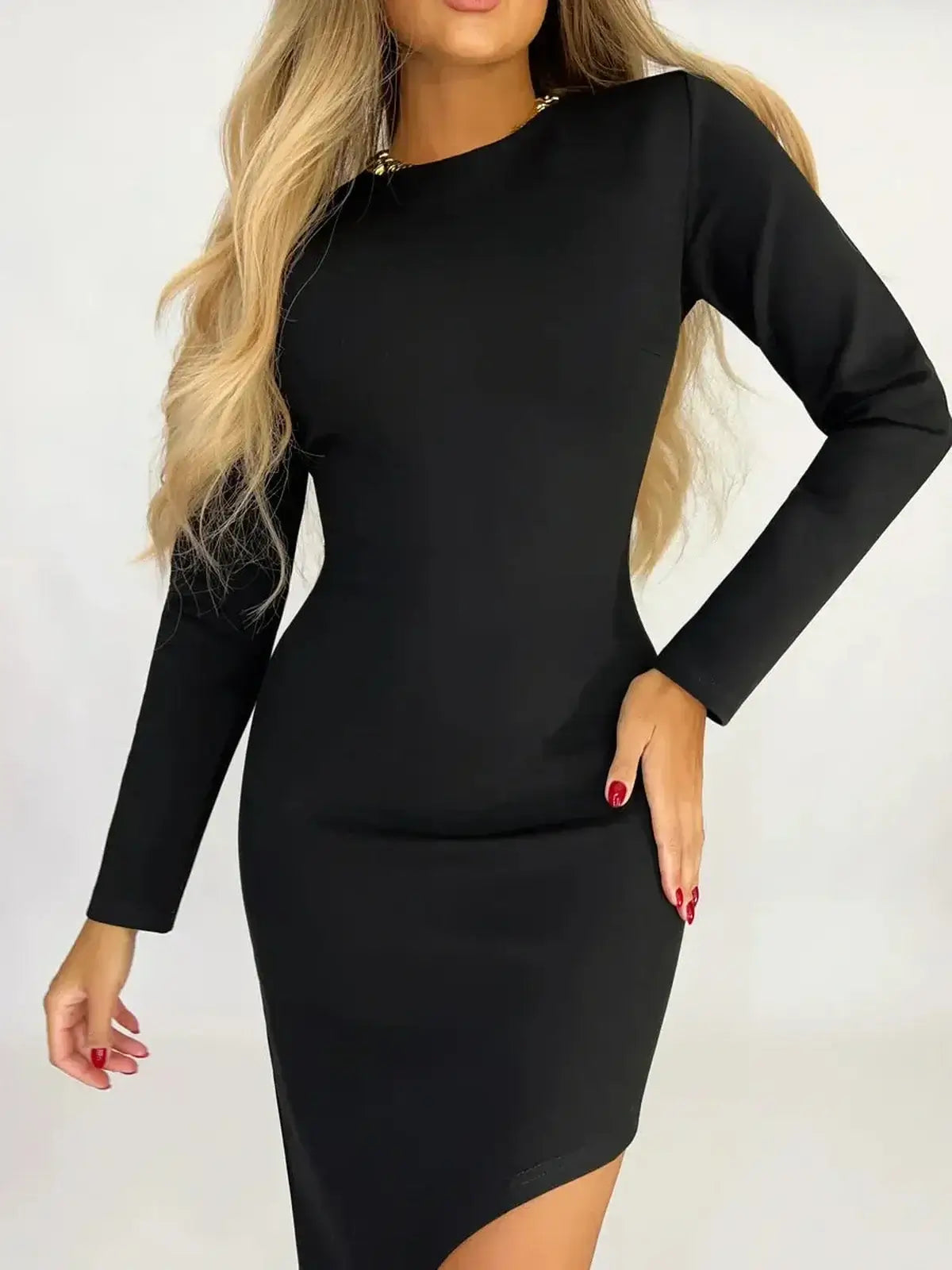 Noirline Maxi Dress featuring a sleek black silhouette, round neckline, and asymmetric hem for modern elegance.