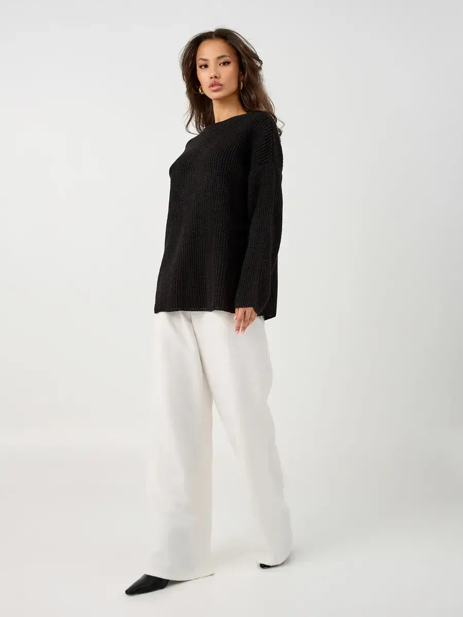 Nola Sweater by Lauven, oversized black knit pullover with crew neck, styled for women's winter fashion.