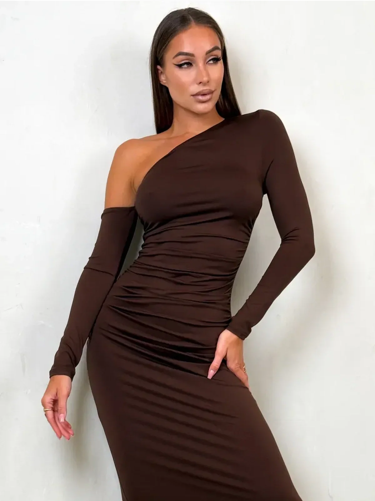 Obsidian Curve Maxi Dress in chocolate brown, featuring one-shoulder elegance and a body-hugging silhouette.