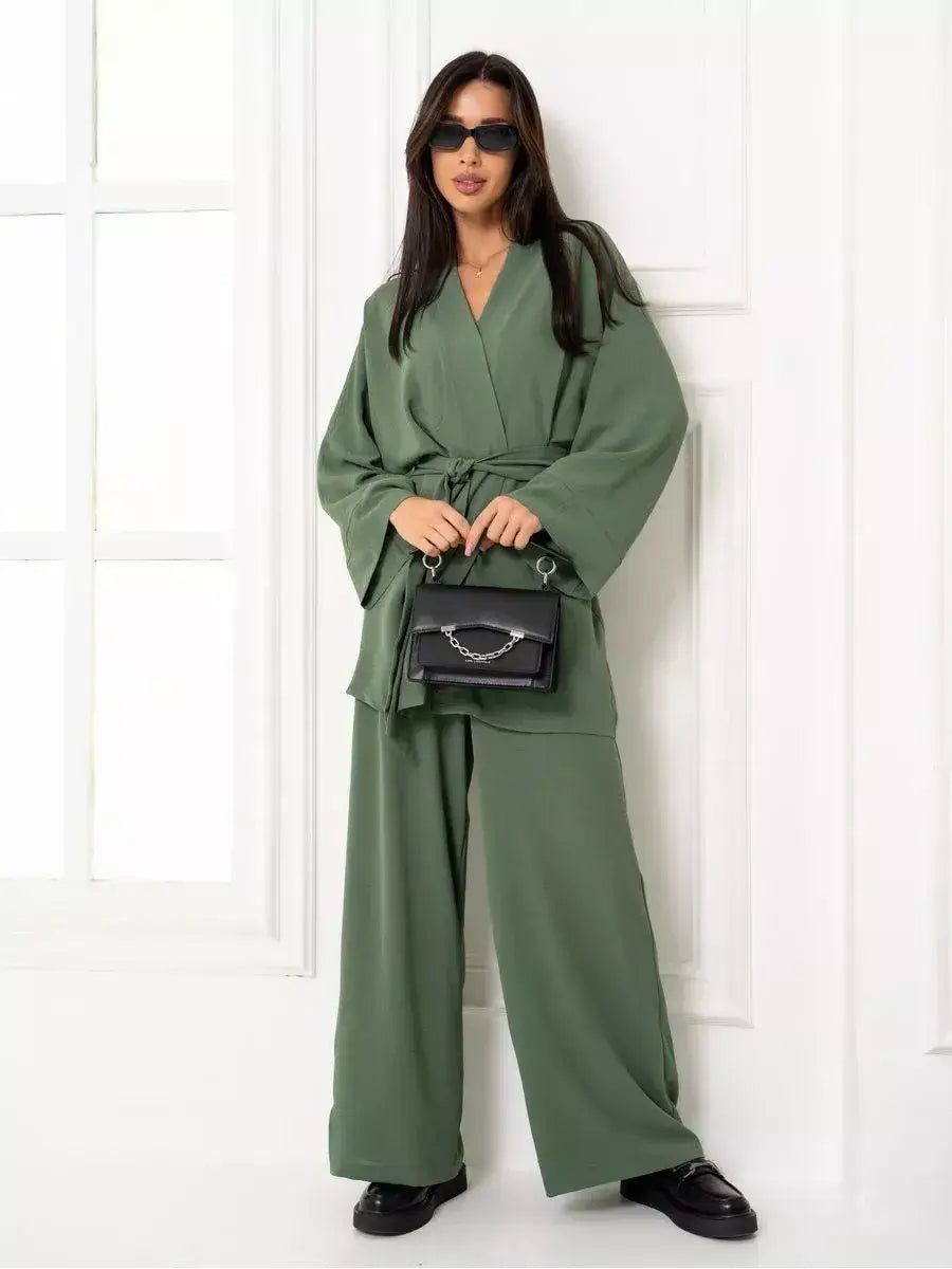 Olive Suit Set by Lauven featuring an elegant oversized two-piece set in soft green with wide-leg trousers.