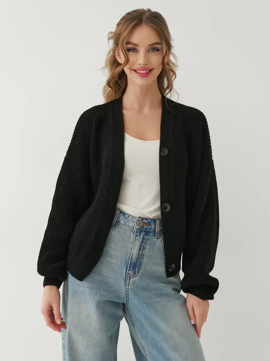 Onyx Cardigan by Lauven, elegant oversized button-front black knitwear, perfect for any modern woman's wardrobe.