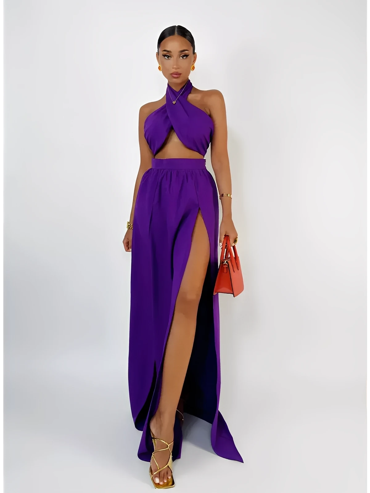 Orchid Drape Set featuring a halter top and high-slit maxi skirt in vivid purple, perfect for summer styling.