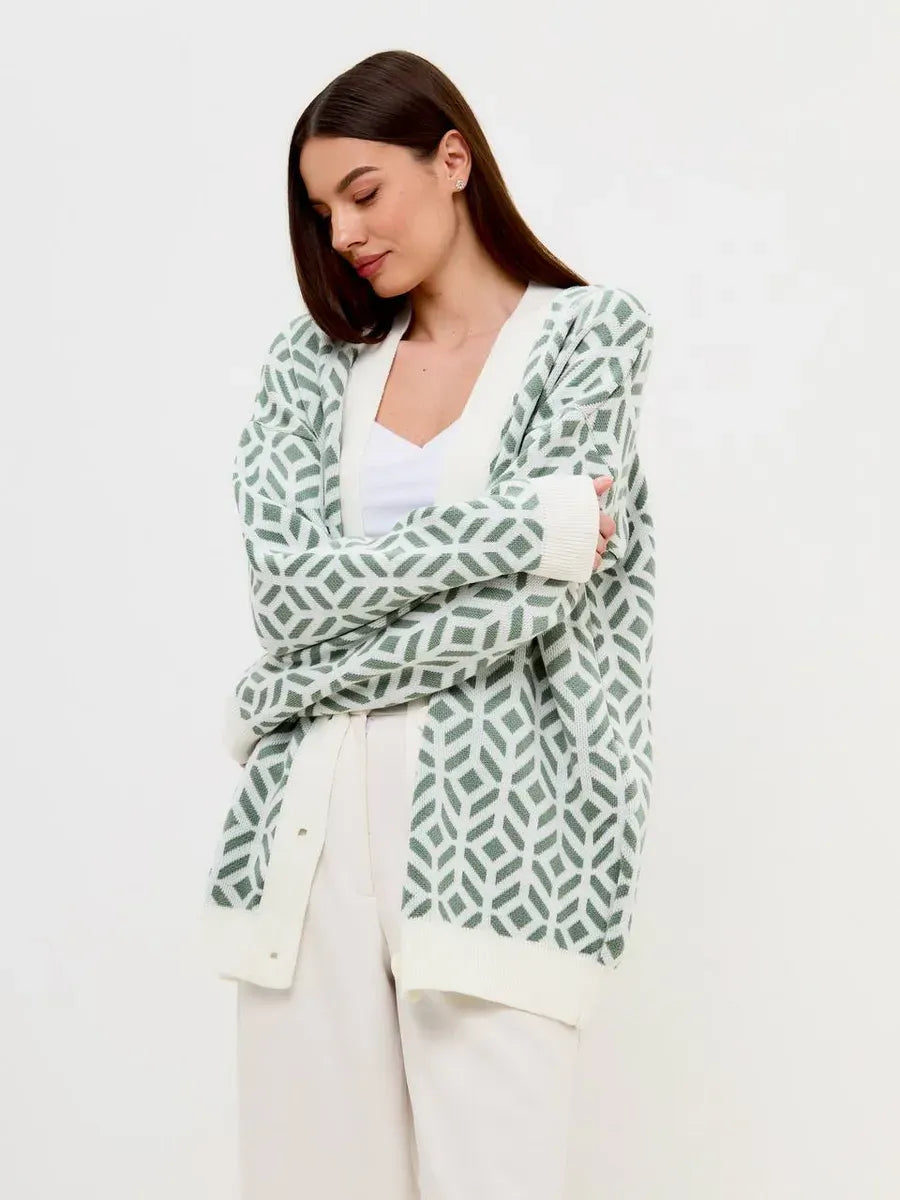 Lauven Pistachio Cardigan in light green pattern worn by a woman with long sleeves and relaxed fit.