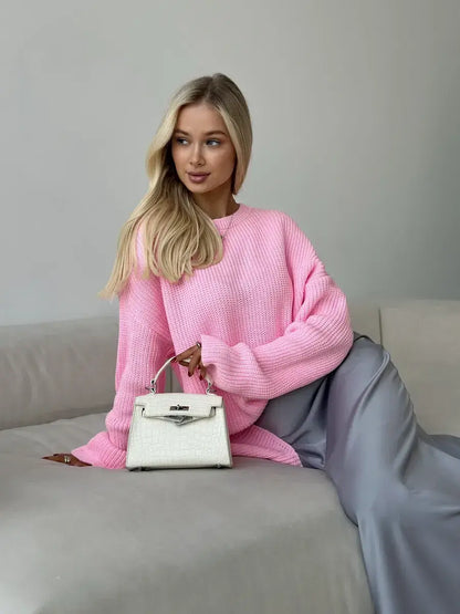 Poppy Sweater by Lauven, oversized light pink knit with crew neck, styled effortlessly with a chic bag.