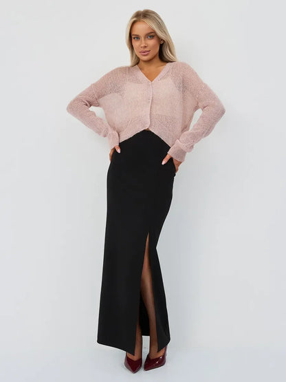 Rose Cardigan by Lauven, oversized mohair-blend knitwear in soft pink, styled with a black maxi skirt.