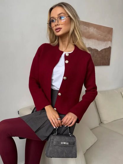 Roslyn Cardigan by Lauven in elegant burgundy, cropped knitwear with button closure styled with a chic outfit.