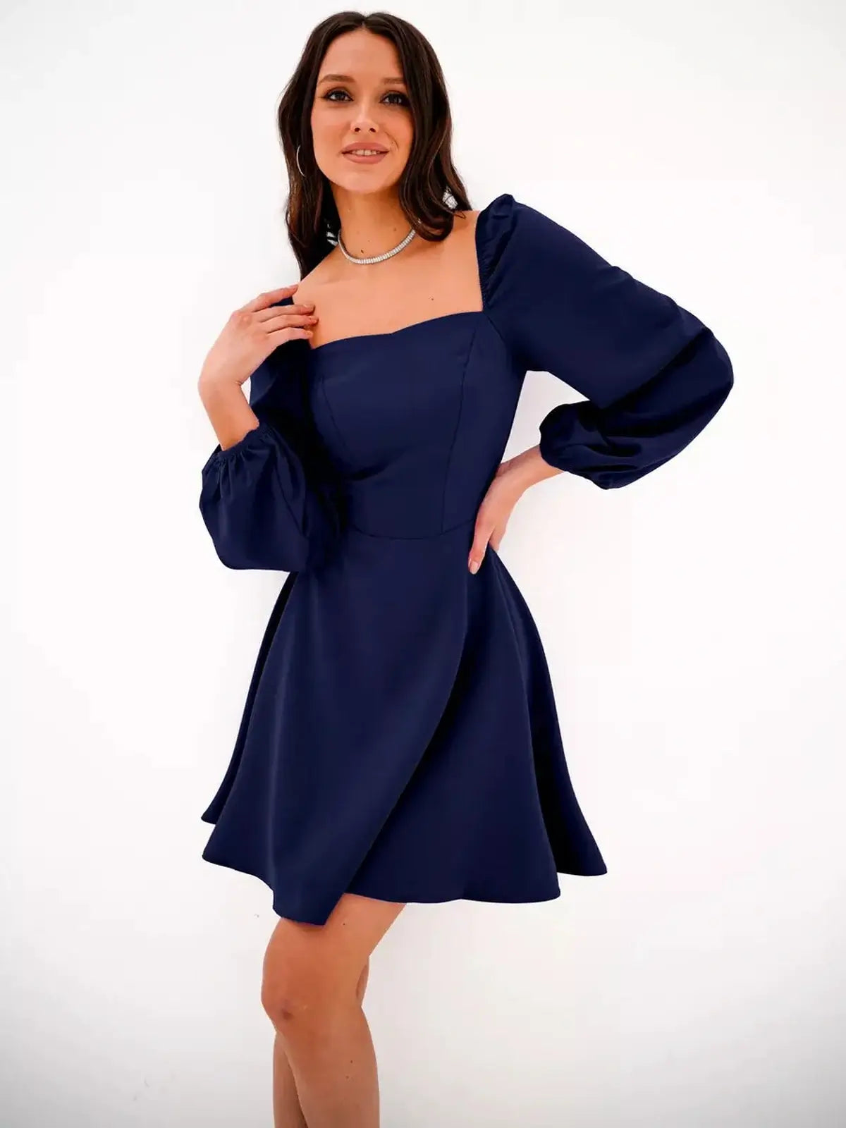 Navy blue Royal Puff mini dress with puff sleeves and square neckline, perfect for summer and formal occasions.