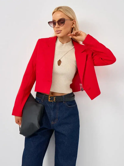Ruby Blazer by Lauven - Cropped tailored red blazer worn with jeans and a top, accessorized with sunglasses.