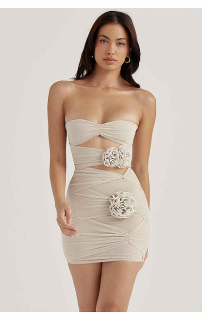 Stylish Ruby Mini Dress featuring cut-out details and rose embellishments, perfect for special occasions and summer wear.