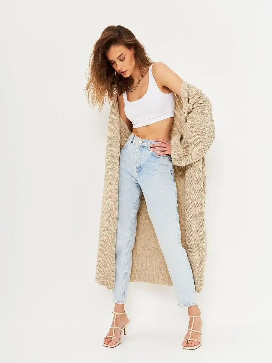 Sable Cardigan by Lauven worn with light jeans and a crop top, showcasing its oversized knitwear style.