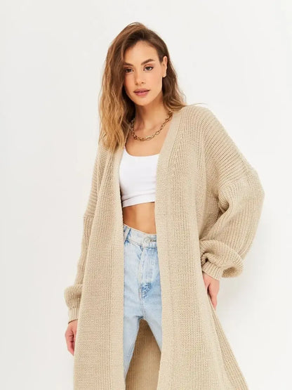 Sable Cardigan by Lauven, a long oversized knitwear coat in soft beige, perfect for autumn layering.