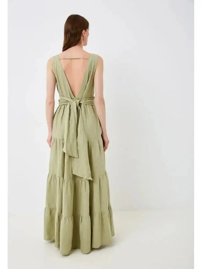 Back view of Sage Whisper Maxi Dress in olive green, showcasing its elegant wrap-style belt and gathered tiers.