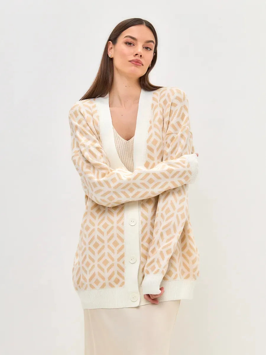 Sandy Cardigan by Lauven, a longline acrylic knitwear in soft beige and sand, perfect for layering.
