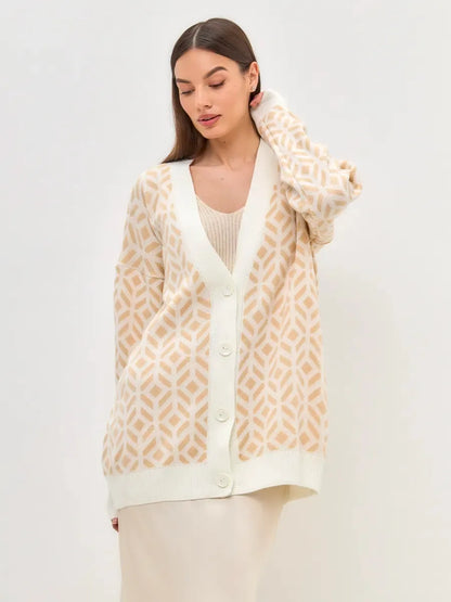 Sandy Cardigan by Lauven, longline acrylic knitwear in soft beige with a geometric pattern, styled for women.