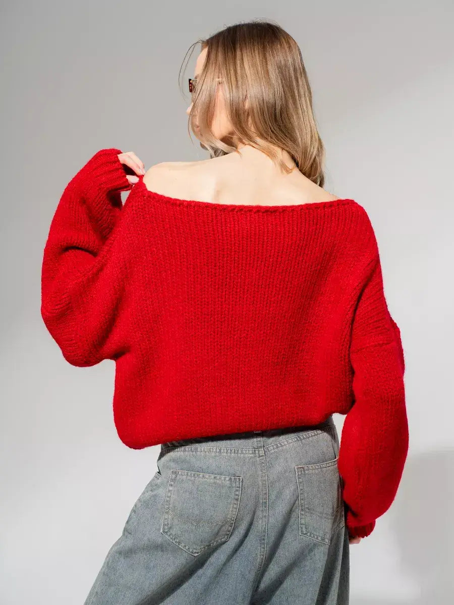 Oversized off-shoulder knit Scarlet Sweater by Lauven in deep red, showcasing its luxurious design and soft material.