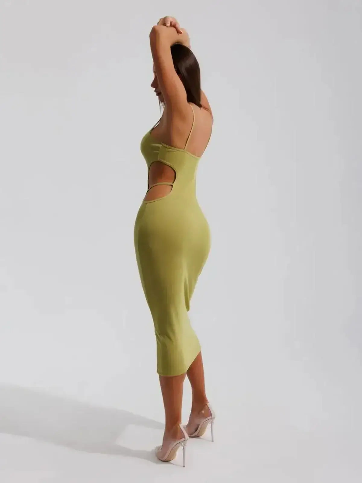 Sculpt Cutout Midi Dress by Lauven, showcasing a fitted silhouette with side cut-outs in a pistachio tone.