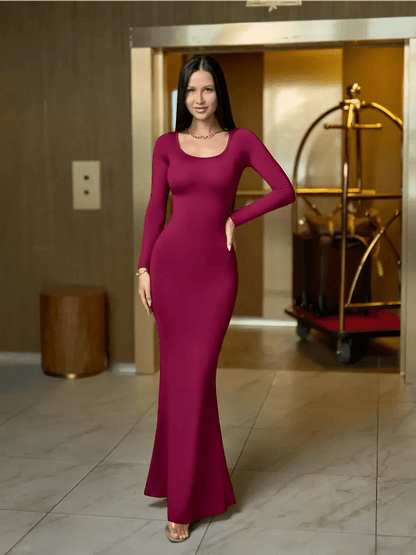 Long sleeve red dress showcasing a sleek, body-hugging fit, perfect for formal events or evening occasions.