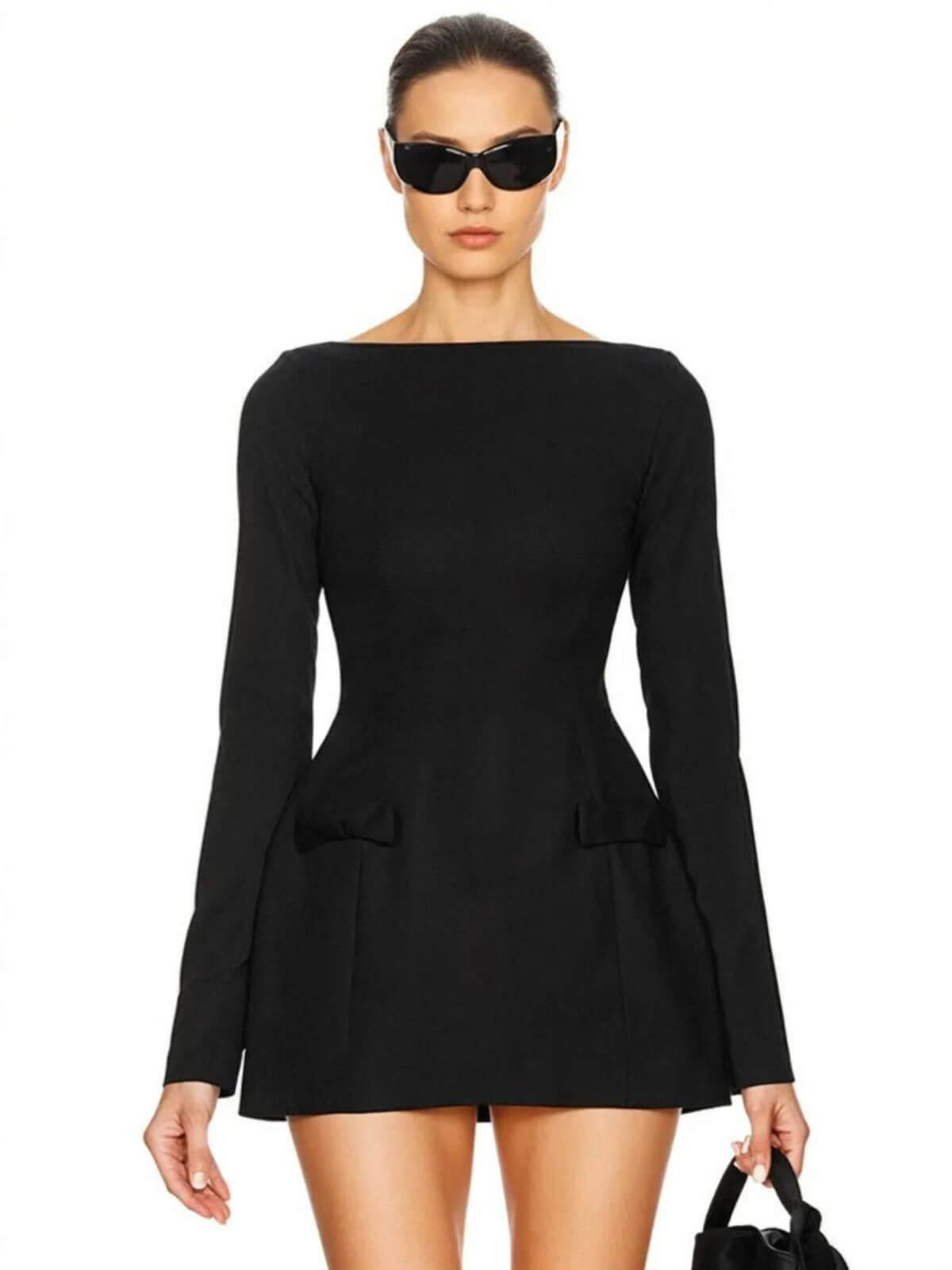 Sculpted Grace black mini dress with long sleeves and a sculptural silhouette, perfect for parties or weddings.