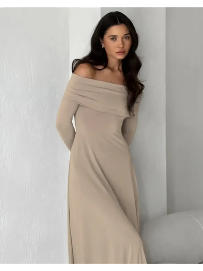 Off-shoulder cappuccino-toned maxi dress showcasing elegant silhouette and body-hugging fabric for refined comfort.
