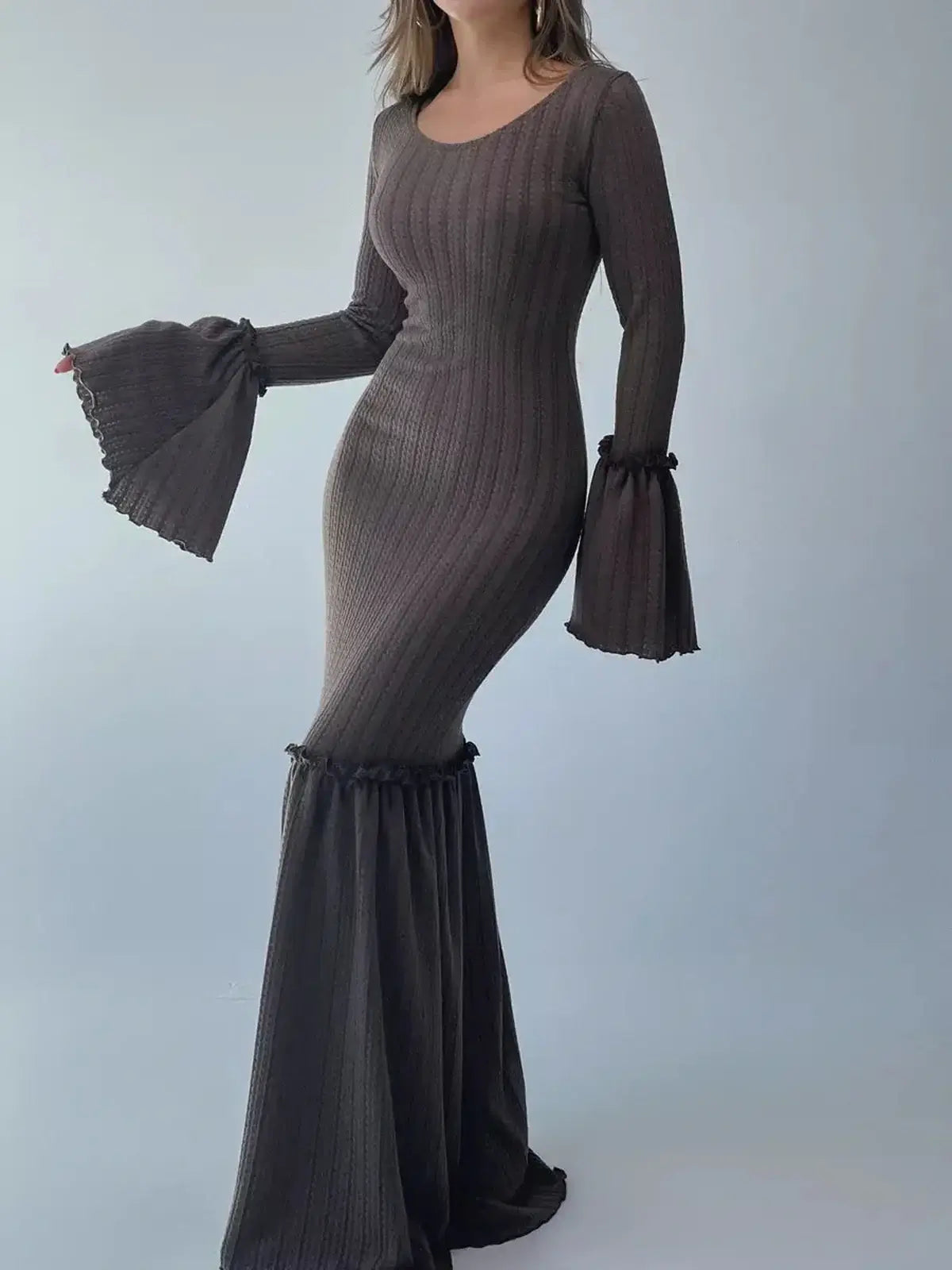Sculpted Grace Maxi Dress in chocolate brown featuring flared sleeves and a dramatic fishtail hem for evening elegance.