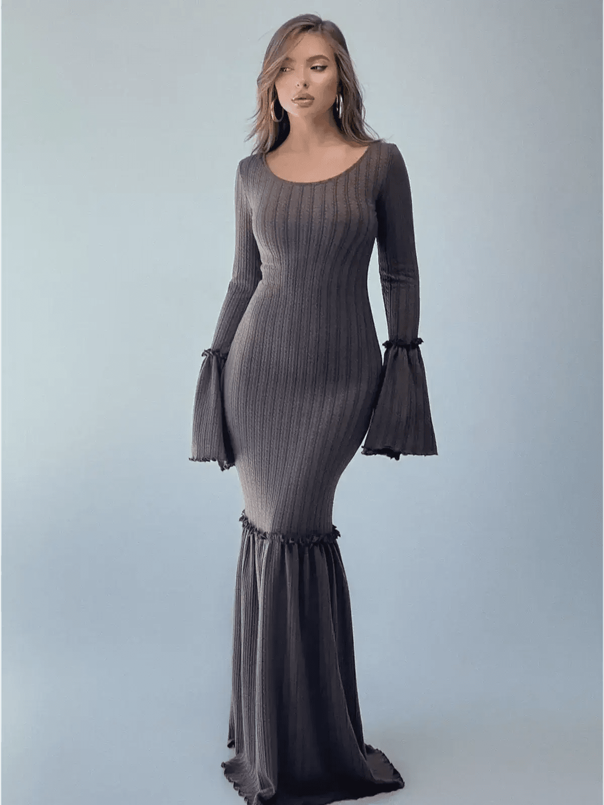 Sculpted Grace Maxi Dress in chocolate brown with flared sleeves and fishtail hem, showcasing fitted elegance and dramatic flair.