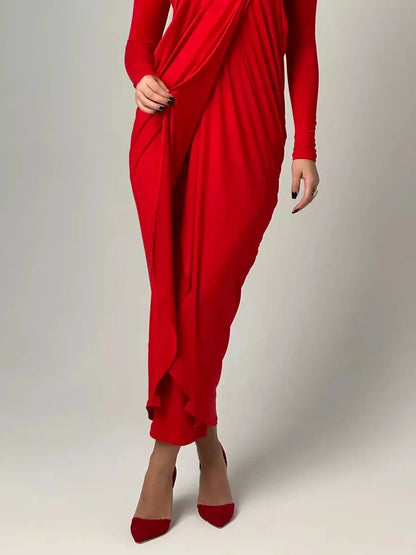 Sculpted Grace Maxi Dress in red with luxe draping, showcasing a silhouette-enhancing design and knotted waist detail.