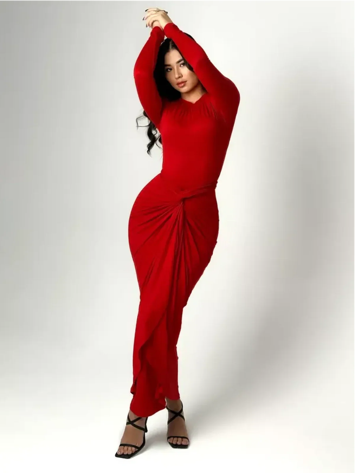 Sculpted Grace Maxi Dress in red, featuring elegant draping and a knotted waist for a flattering silhouette.