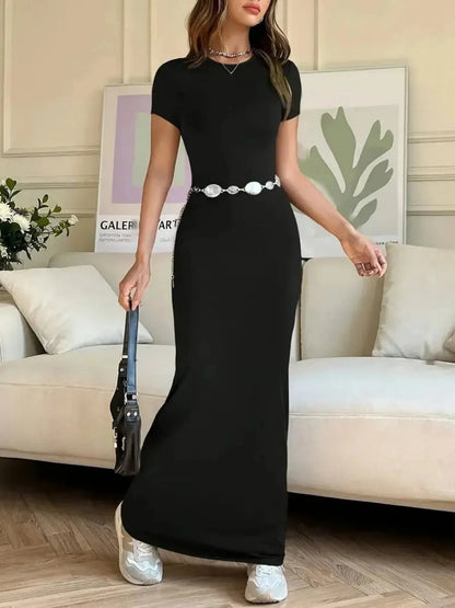 Sculpted Grace Maxi Dress in black, showcasing a sleek silhouette and elegant details for a modern look.