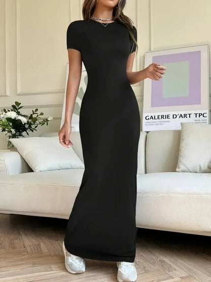 Sculpted Grace Maxi Dress in sleek black, showcasing a fitted silhouette and modern elegance for versatile styling.