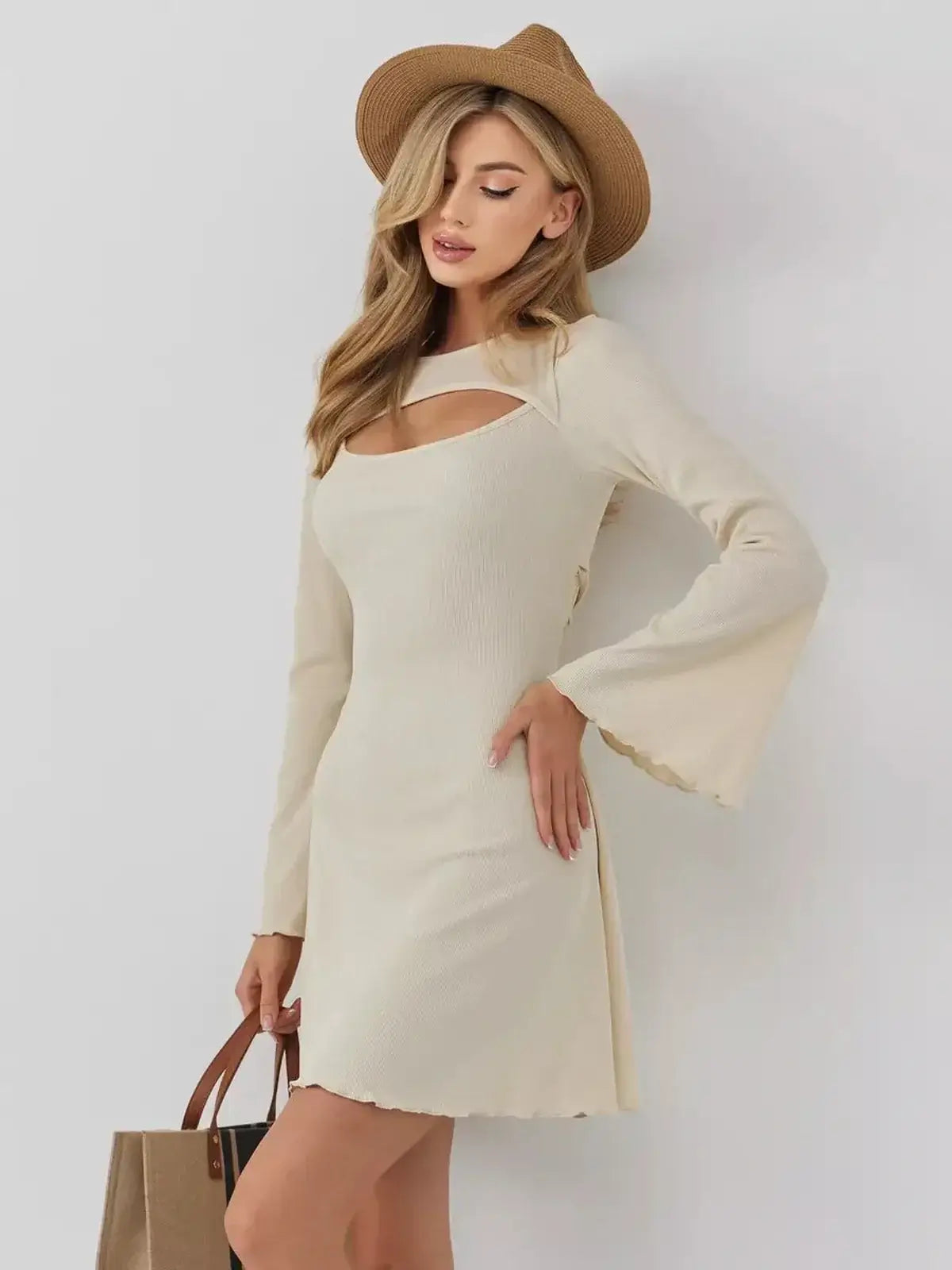 Sculpted Grace mini dress by Lauven featuring a boat neckline and front cutout for a chic, modern look.