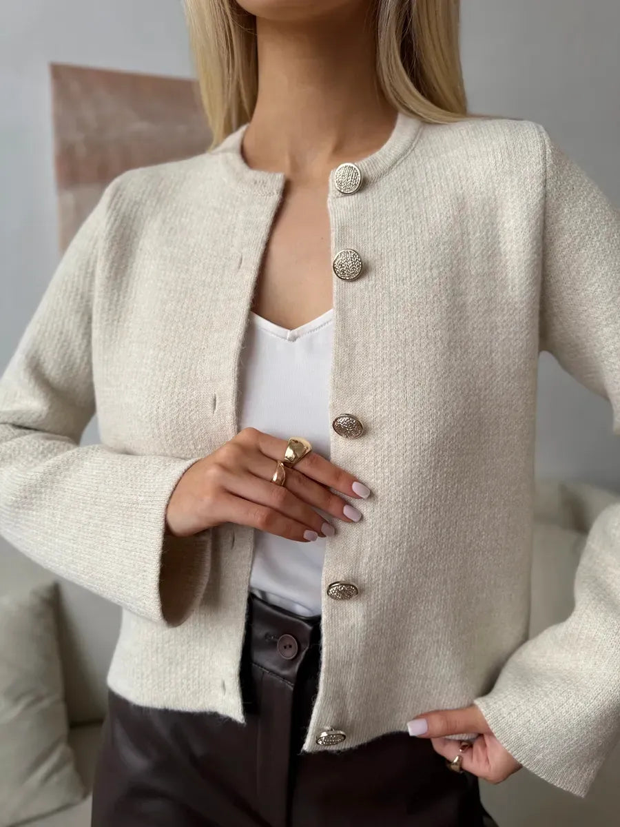 Selene Cardigan by Lauven, chic beige cropped knitwear with decorative buttons, perfect for modern women's style.