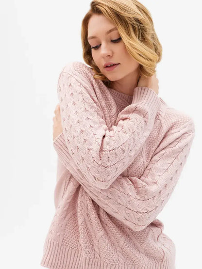 Seren Sweater by Lauven in powder pink, showcasing cable knit design and soft, cozy wool-acrylic blend.