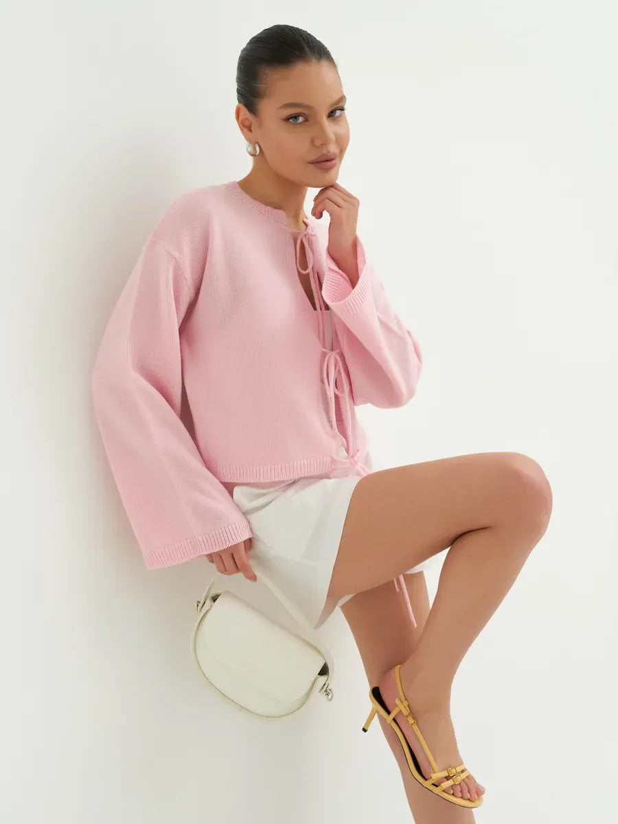 Serena Cardigan by Lauven, lightweight summer knitwear in soft powder pink, showcasing stylish summer elegance.