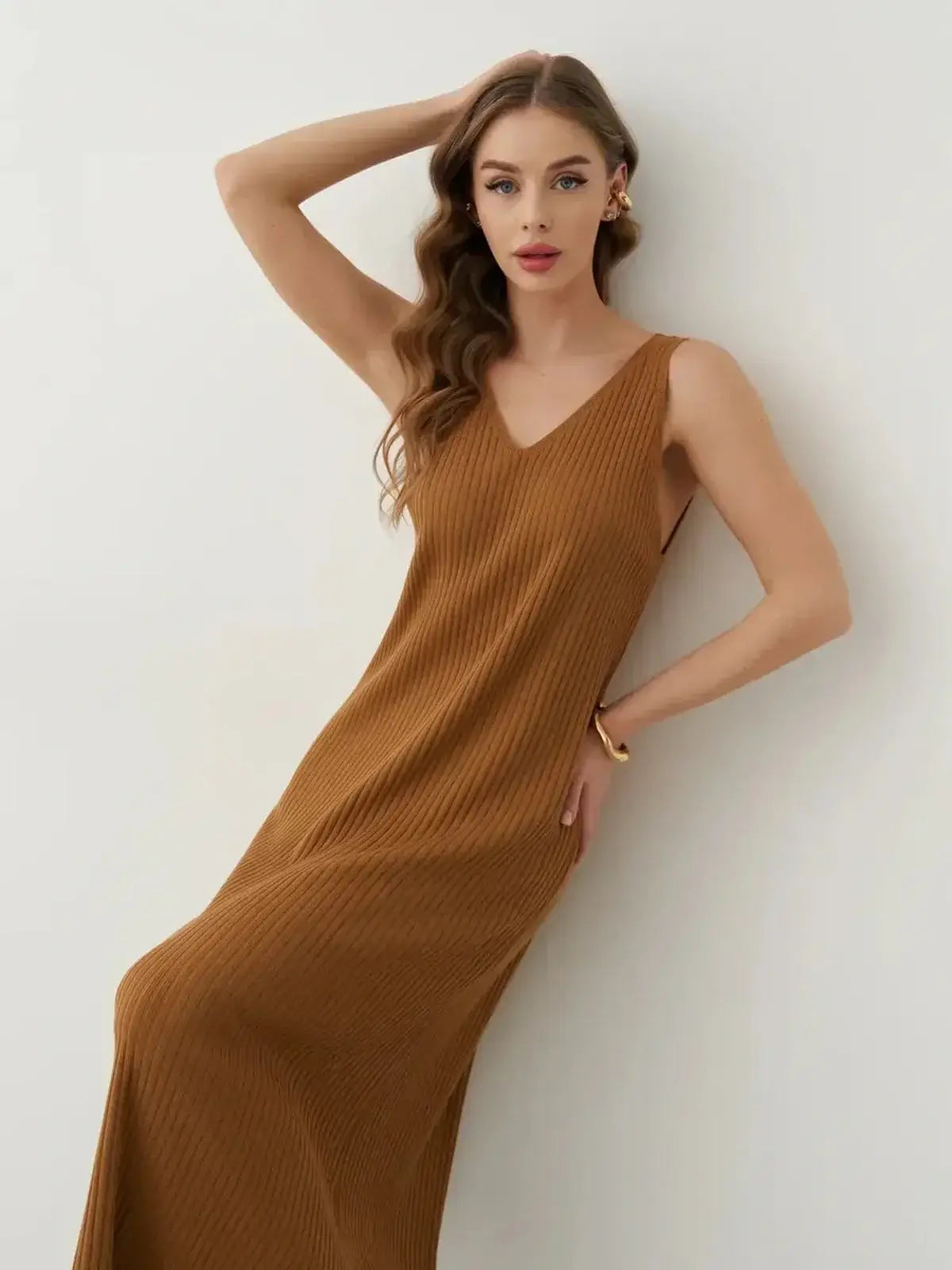Model displaying the Serena Maxi Dress in a ribbed silhouette, featuring a flattering V-neckline and effortless elegance.