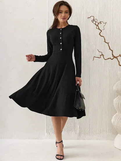 Serene Grace Midi Dress by Lauven - Elegant black ribbed midi dress with decorative buttons and flared skirt.