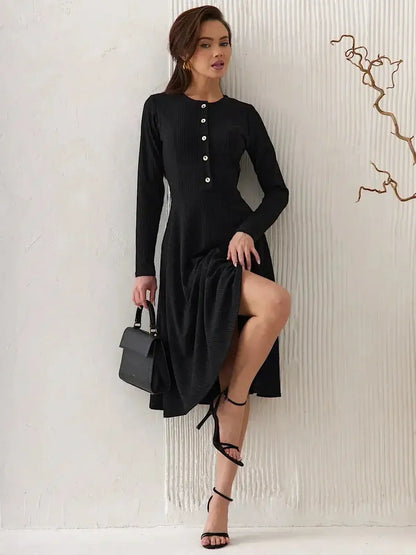 Serene Grace Midi Dress by Lauven featuring a black ribbed silhouette with decorative buttons, showcasing refined elegance.