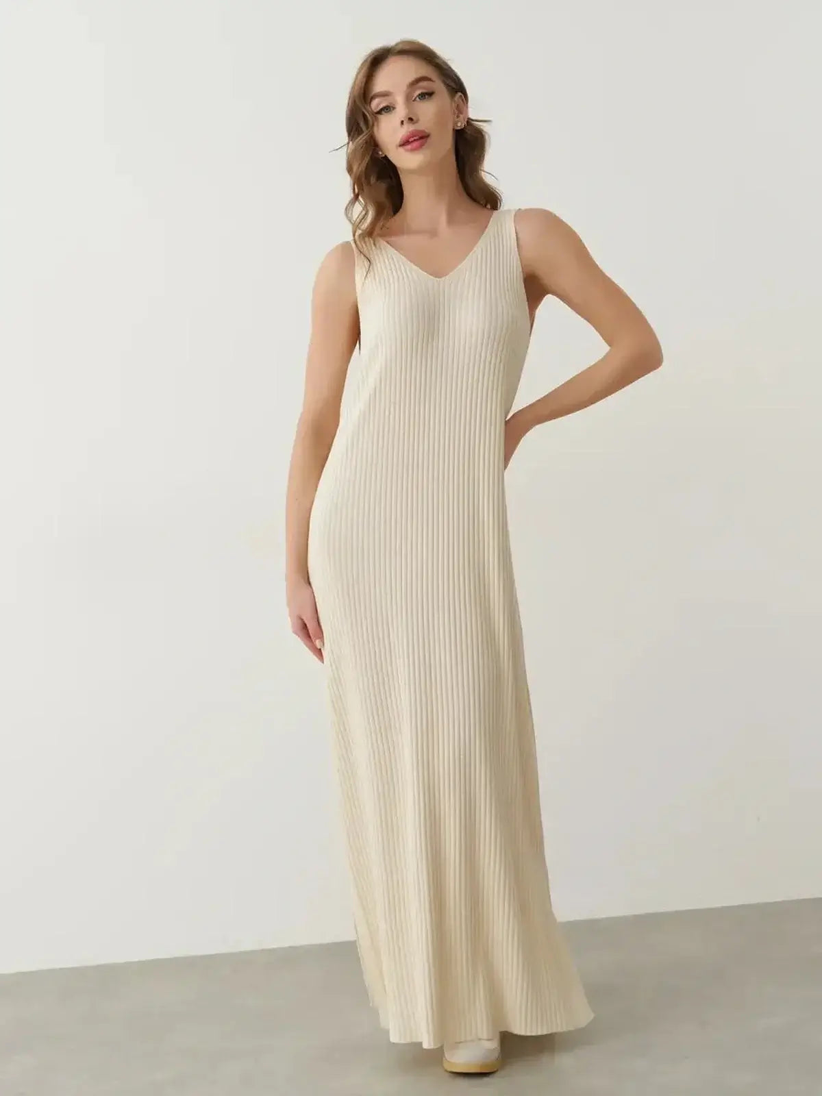 Serene Rib Maxi Dress in soft knit, featuring a V-neckline and a flowing silhouette, perfect for summer wear.