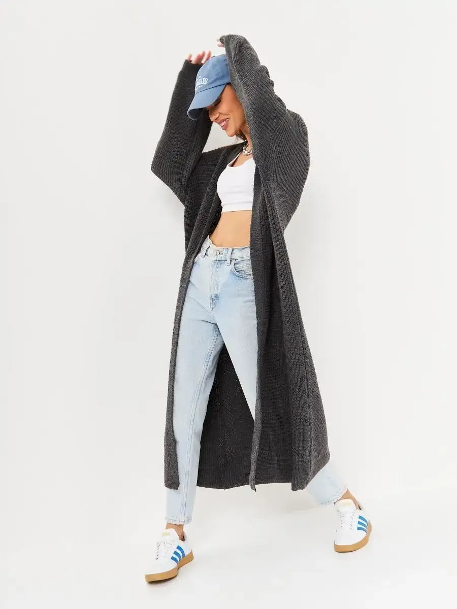 Shadow Cardigan by Lauven worn by a model, showcasing a chic long oversized knitwear coat in deep gray.