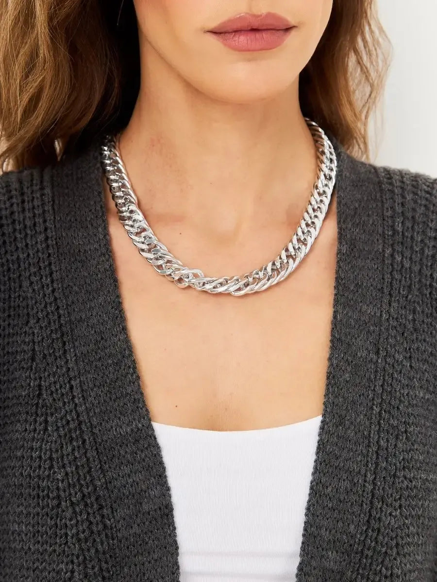 Long Oversized knitwear coat styled with a silver chain necklace, featuring the Shadow Cardigan by Lauven.