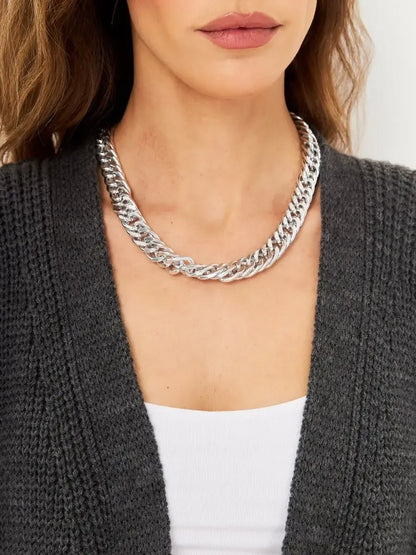 Long Oversized knitwear coat styled with a silver chain necklace, featuring the Shadow Cardigan by Lauven.