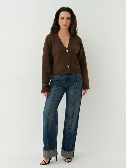 Siena Cardigan by Lauven in cropped chocolate brown with heart buttons, styled with blue jeans.