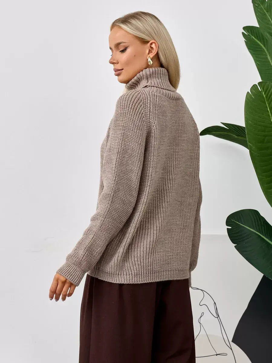 Siena Sweater by Lauven, oversized beige knit turtleneck sweater for women, showcasing a relaxed silhouette.