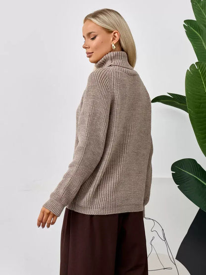 Siena Sweater by Lauven, oversized beige knit turtleneck sweater for women, showcasing a relaxed silhouette.