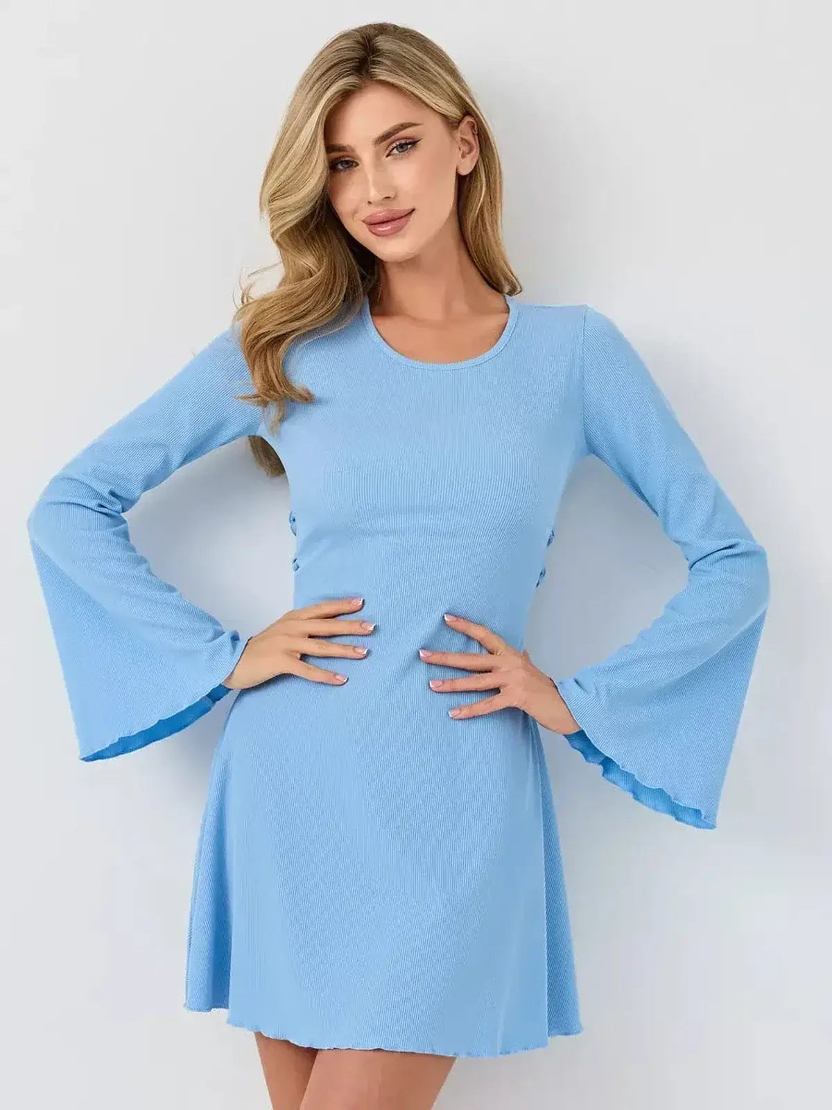 Sky Belle by Lauven, a pastel blue ribbed knit mini dress with flared sleeves and A-line cut for elegant summer moments.