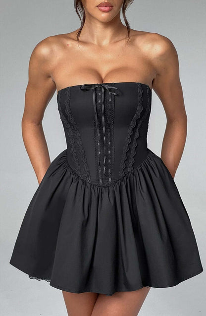 Elegant black corset mini dress with strapless neckline, perfect for parties and evening events.