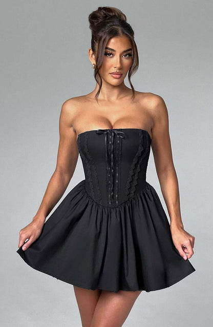 Skye Mini Dress in black with corset design, perfect for cocktail parties or formal occasions for women.