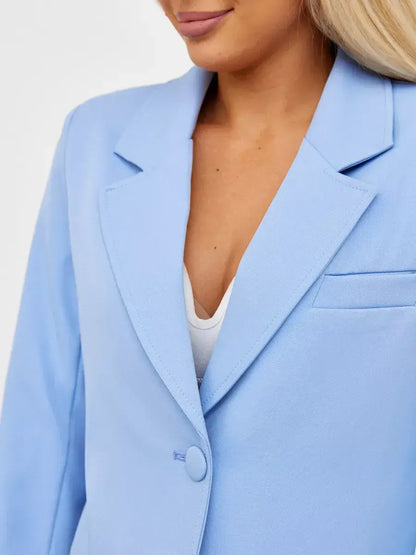 Skyline Blazer by Lauven in soft blue, showcasing a cropped tailored design for timeless elegance.