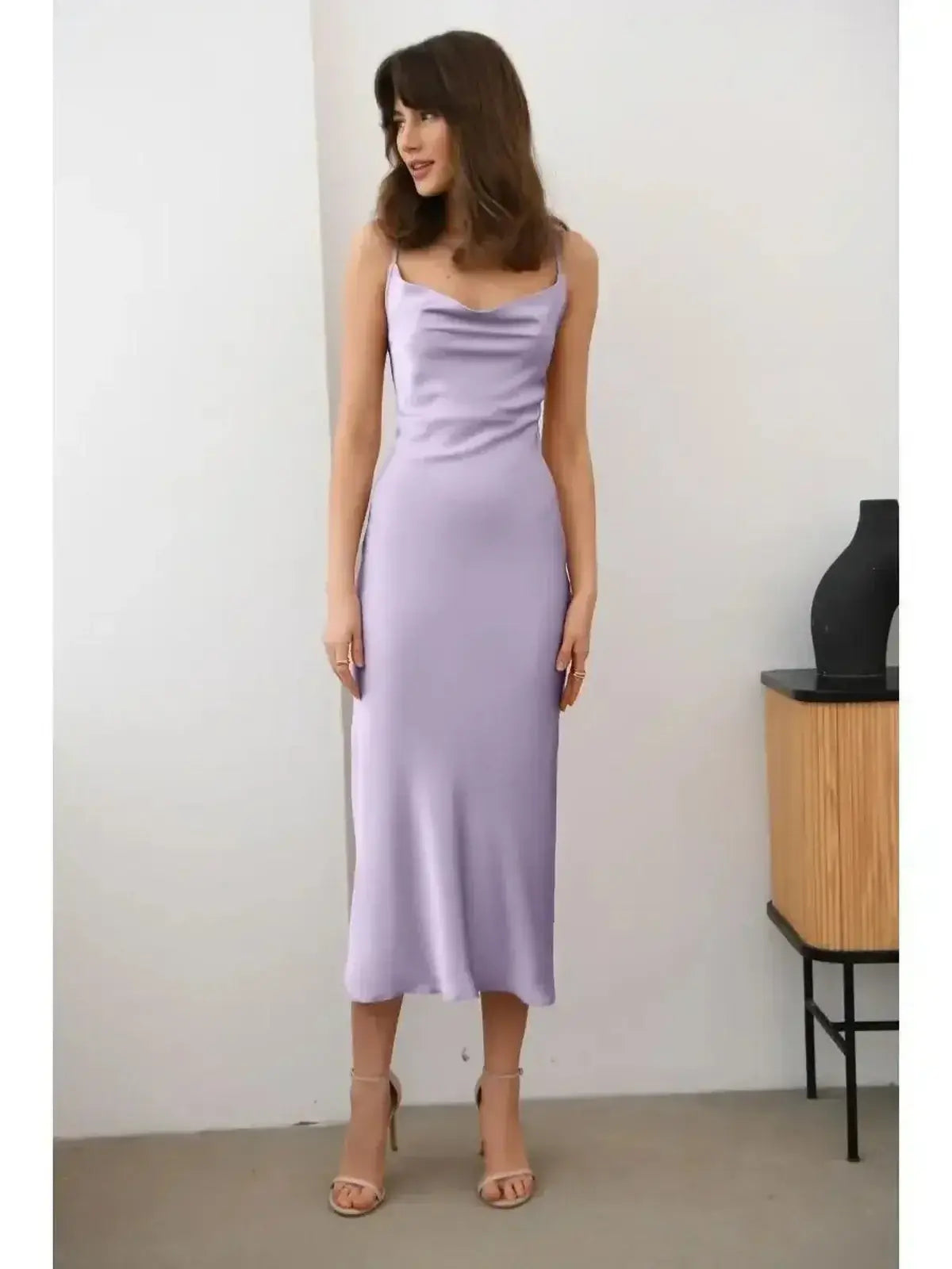 Sleek lavender Whisper Midi Dress with satin drape, perfect for elegant summer events.
