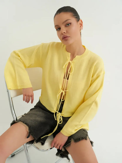 Solara Cardigan by Lauven - Cropped yellow knit with tie-front detailing, perfect for summer layering.